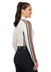 Side view of woman wearing a light beige long sleeve riding shirt