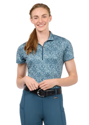 Woman wearing a blue short sleeve riding shirt, front view