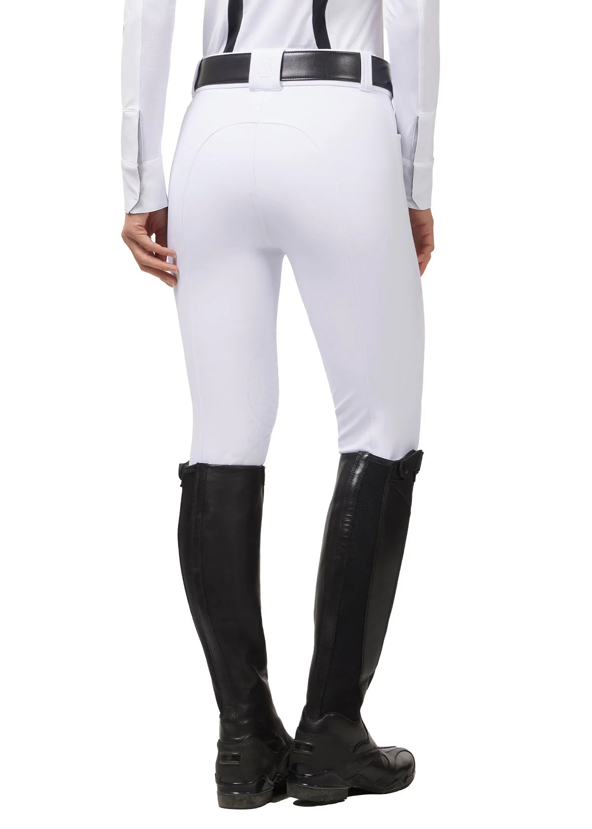Back view of a model wearing the white Kerrits Affinity Pro Knee Patch Breech on a white background