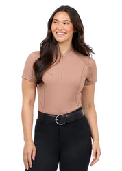 Woman wearing a tan short sleeve quarter zip riding top, front view