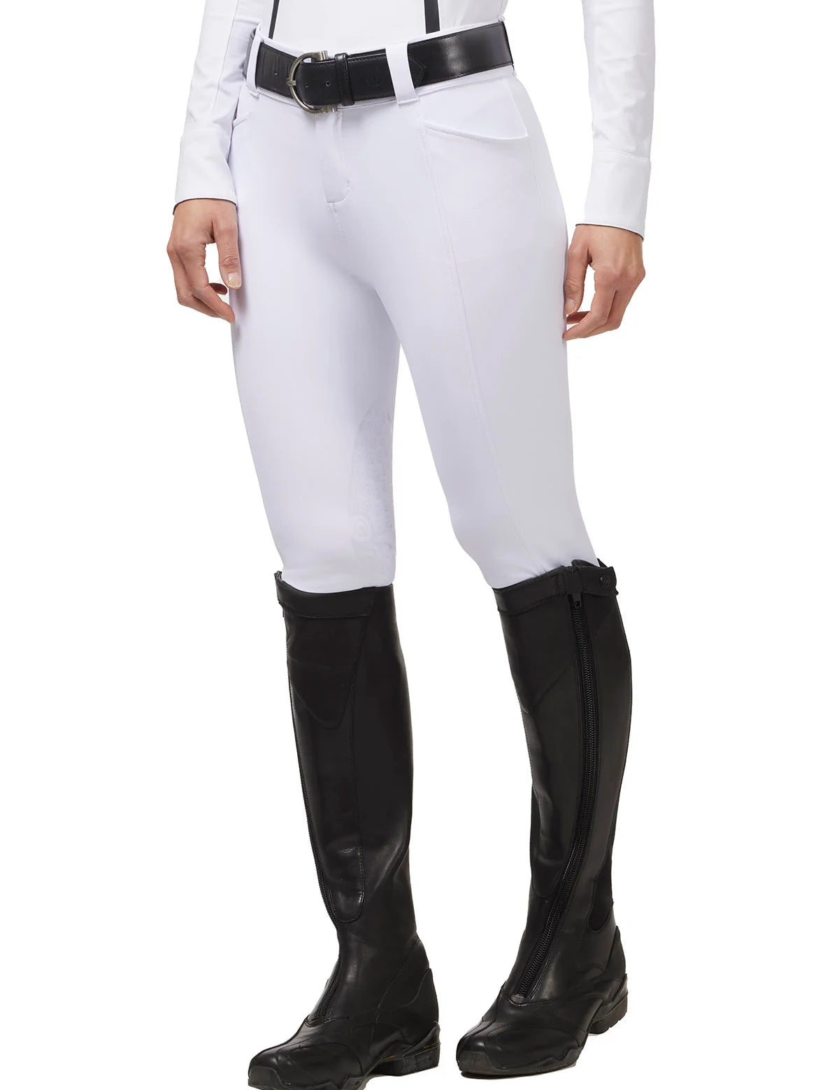 Front view of a model wearing the white Kerrits Affinity Pro Knee Patch Breech on a white background