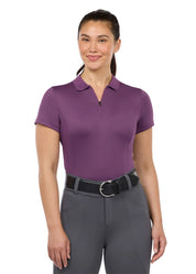 Front view of a femal model wearing the purple Kerrits Serenity Coolcore Short Sleeve Polo on a white background