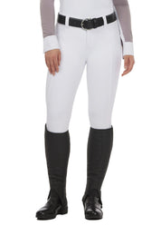 Front view of a model wearing the white Kerrits Affinity Pro Full Seat Breech on a white background