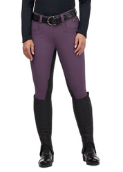 Front view of a model wearing the purple Kerrits GripTek™ II Full Seat Riding Breech on a white background