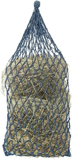 Full view of a navy and baby blue Equi-Essentials Niblet Slow Feed Hay Net filled with hay on a white background