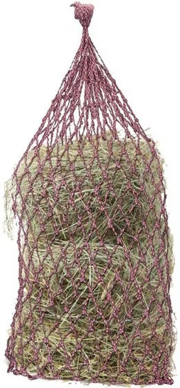 Full view of a maroon and pink Equi-Essentials Niblet Slow Feed Hay Net filled with hay on a white background