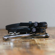 View of the Disco Ball Mane Jane Spur Straps on a wooden surface