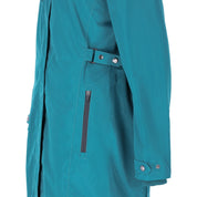 Close-up side view of the Colonial Blue Schockemohle Kaija Raincoat on a white background