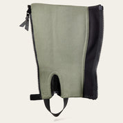 Flat interior view of the black Ariat Breeze Half Chap on a plain background