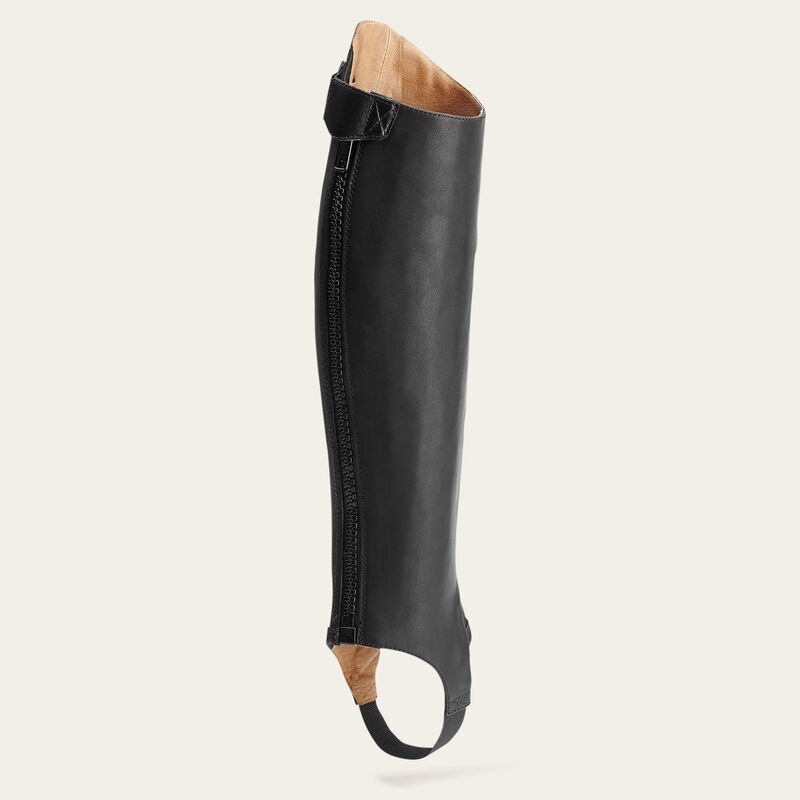 Angled back view of the Ariat Close Contour Half Chaps on a plain background