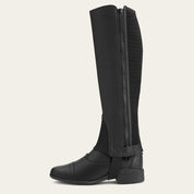 Ariat Scout Half Chap in black worn over paddock boot showing side zipper