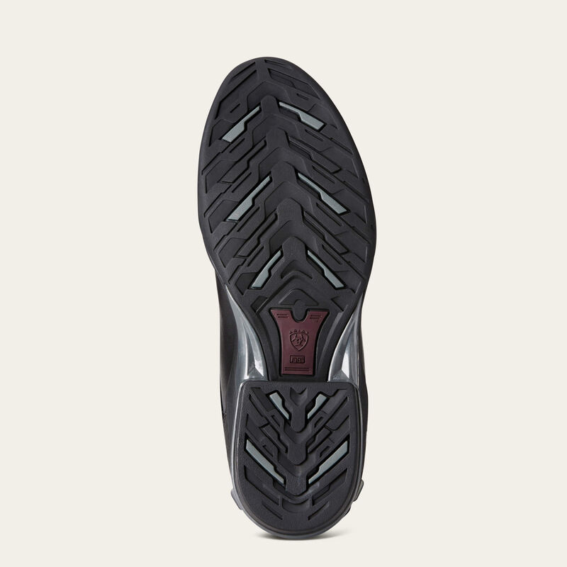 Bottom view of the sole of the Ariat V Sport Perforated Zip Tall Riding Boot on a plain background
