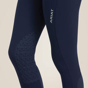 Close-up side view of the navy Ariat Tri Factor Grip Knee Patch Breech on a plain background