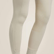 Close-up side view of the tan Ariat Tri Factor Grip Knee Patch Breech on a plain background