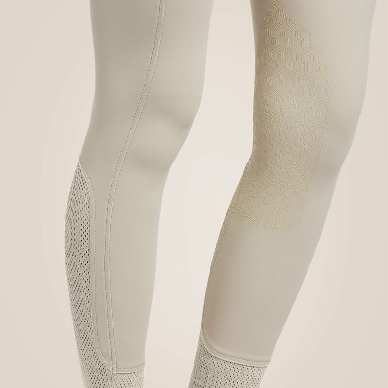 Close-up side view of the tan Ariat Tri Factor Grip Knee Patch Breech on a plain background