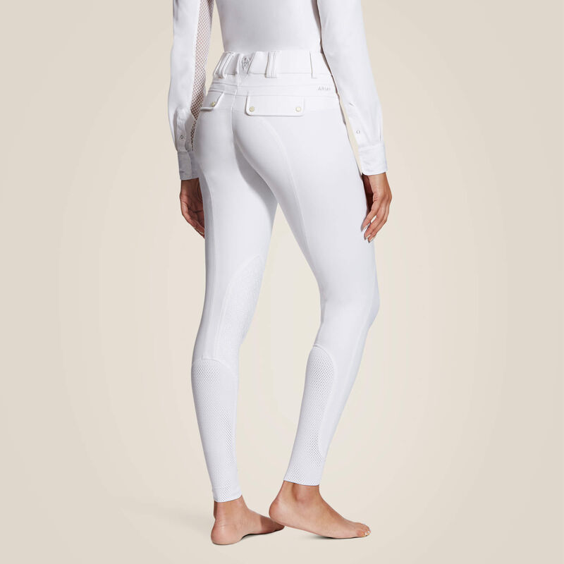 Back view of a model wearing the white Ariat Tri Factor Grip Knee Patch Breech on a plain background