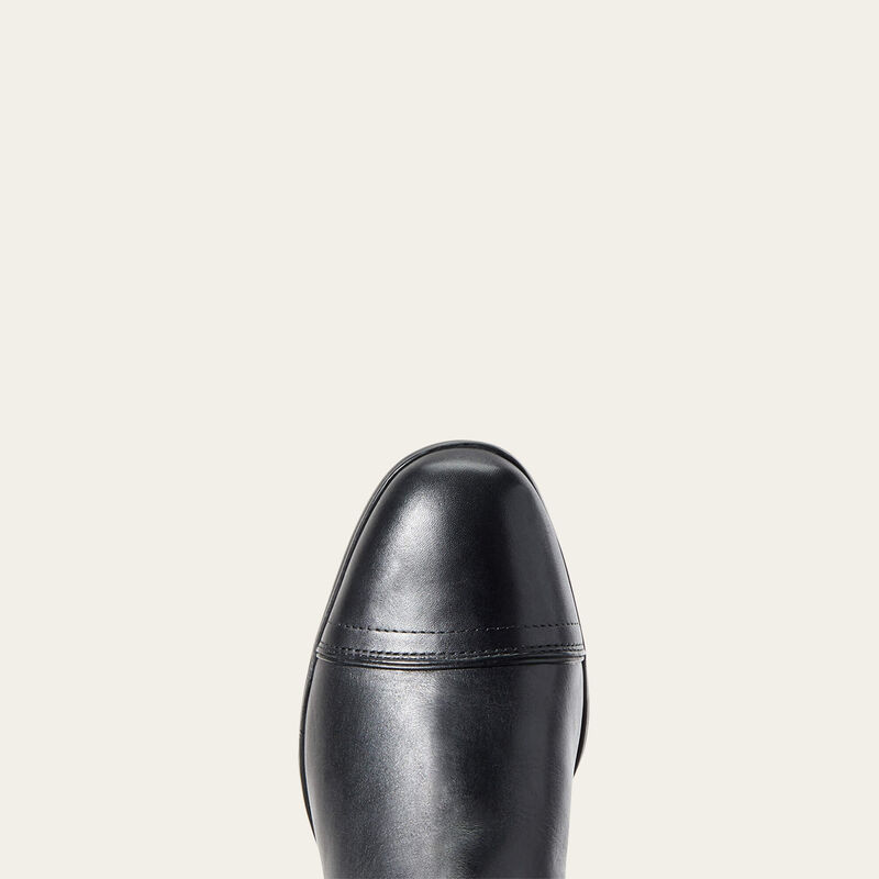 Top view of the toe cap on the Ariat Kinsley Dress Tall Boot on a plain background
