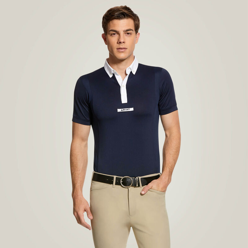 Front view of male model wearing the Ariat Mens Tek Short Sleeve Show Shirt in blue and tan breeches in a studio setting