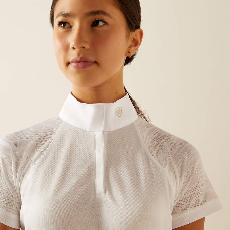 Close up front view of the collar and sleeve detail of the Ariat Aptos Vent 2.0 Show shirt in white, on a model in a studio setting
