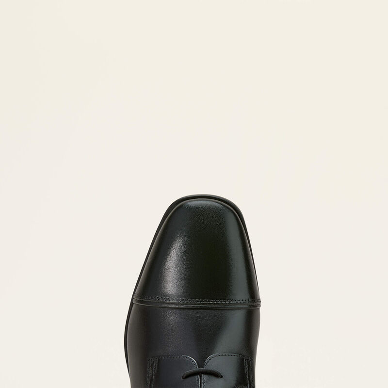 Top view of the toe cap on the black Ariat Palisade Field Boot on a plain background