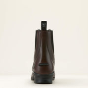 Back view of the brown Ariat Heritage Zip Paddock Boot on a plain background