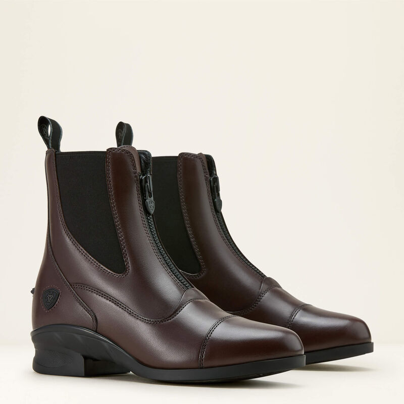 Angled front view of a pair of brown Ariat Heritage Zip Paddock Boots on a plain background