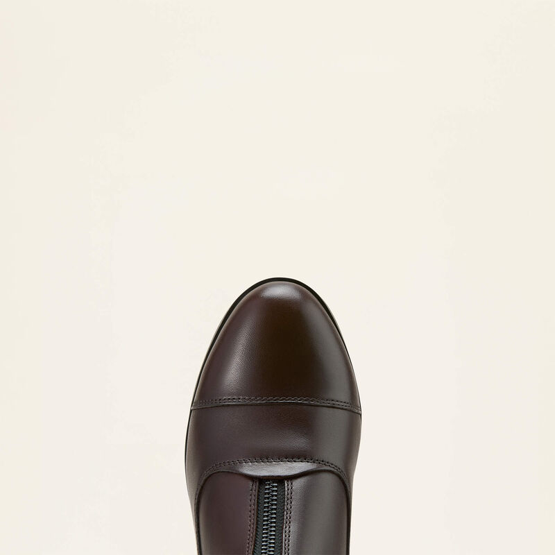 Top view of the toe cap of the brown Ariat Heritage Zip Paddock Boot on a plain background