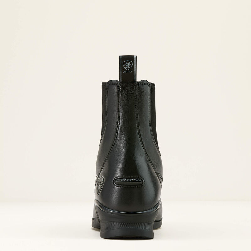 Back view of the black Ariat Heritage Zip Paddock Boot on a plain background