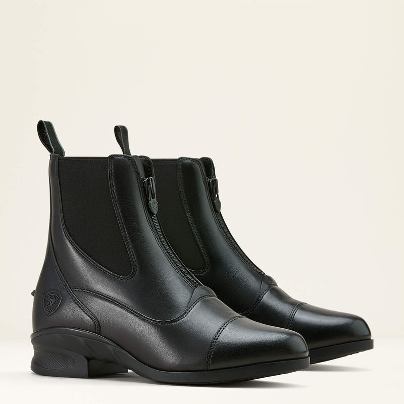 Angled front view of a pair of black Ariat Heritage Zip Paddock Boots on a plain background