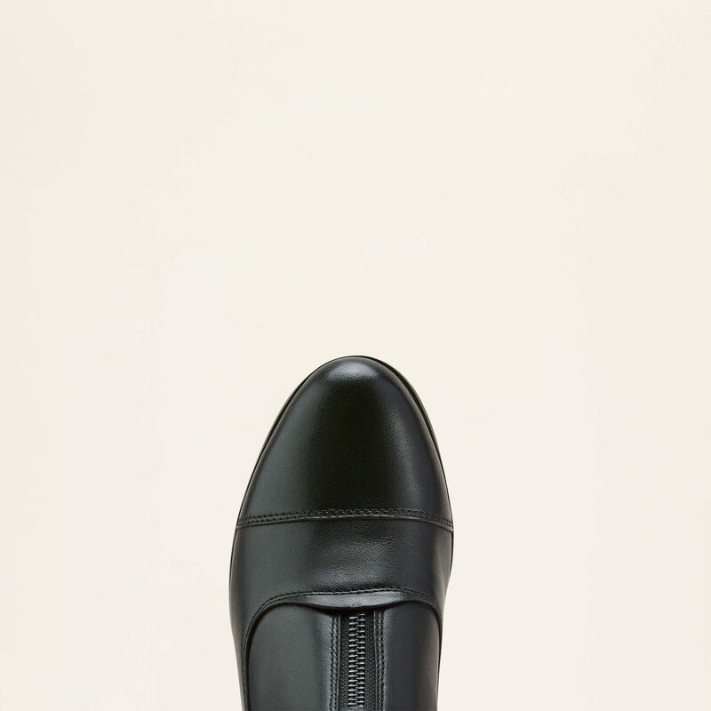 View of the toe cap of the black Ariat Heritage Zip Paddock Boot on a plain background