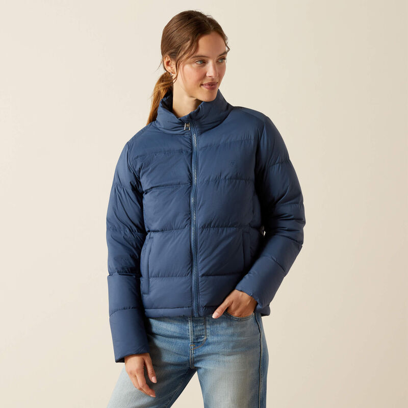 Front view of a female model wearing the Big Dipper Ariat Ultrapuff Down Jacket on a plain background