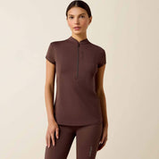 Front view of a model wearing the brown Ariat Breathe 1/2 Zip Baselayer on a plain background