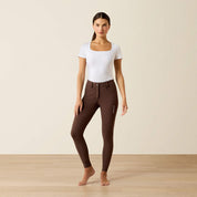 Full body front view of a model wearing the Ariat Tri Factor NT Full Seat Breech in brown in a studio setting