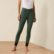 Ariat Protege Full Seat Breeches in Monstera green, front view worn with white short sleeve top