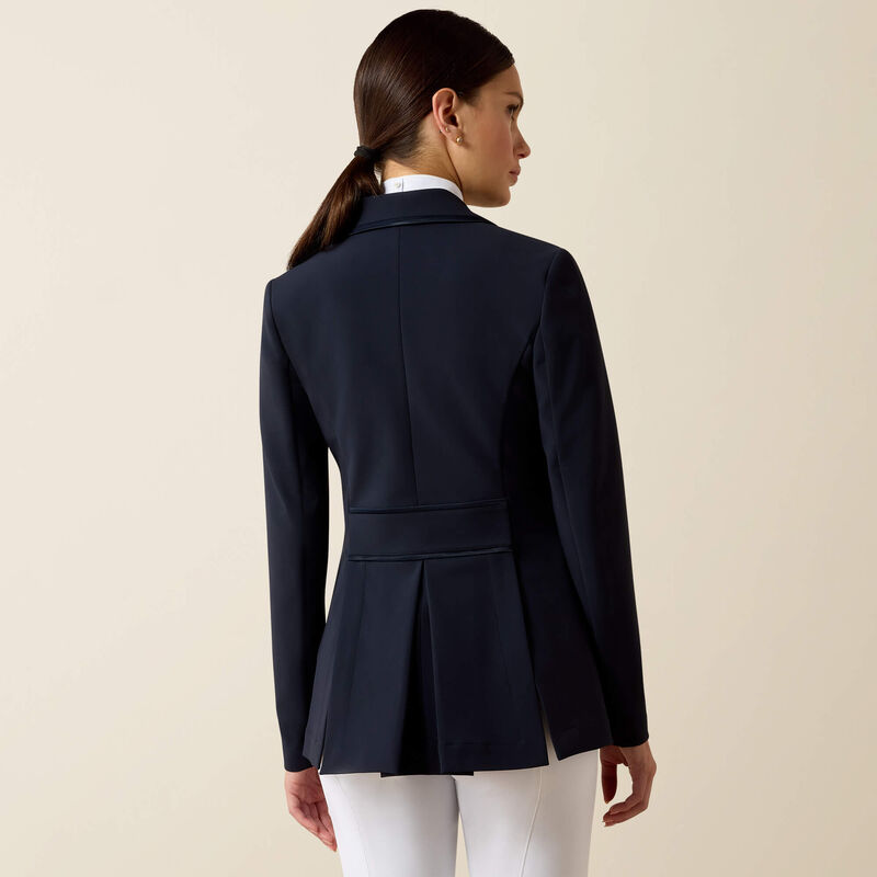 Back view of a female model wearing the Navy Eclipse Ariat Allure Show Coat on a plain background