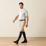 Full view of male model wearing the Ariat Mens Tek Short Sleeve Show Shirt in gray, tan breeches, and tall black boots in a studio setting