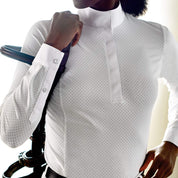 Front view of model wearing the Ariat Breathe Long Sleeve Showshirt in white with a bridle on her shoulder