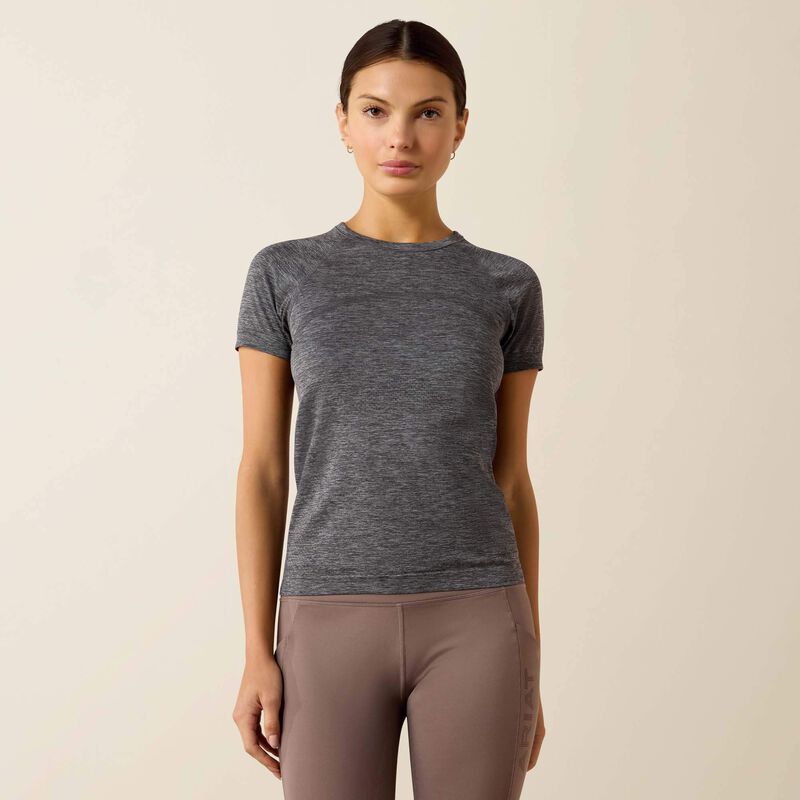 Front view of a model wearing the Ariat Sustain Short Sleeve Baselayer in gray in a studio