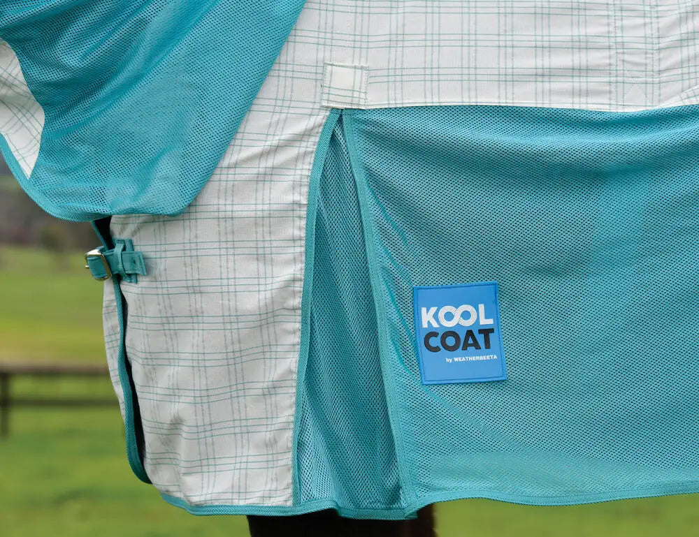 Close-up side view of the elbow of a horse wearing the white/mint Weatherbeeta Kool Coat Cotton Airstream II Detach-A-Neck
