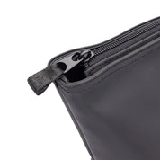 Close-up view of the zipper on the Aubrion React Tote Bag on a white background