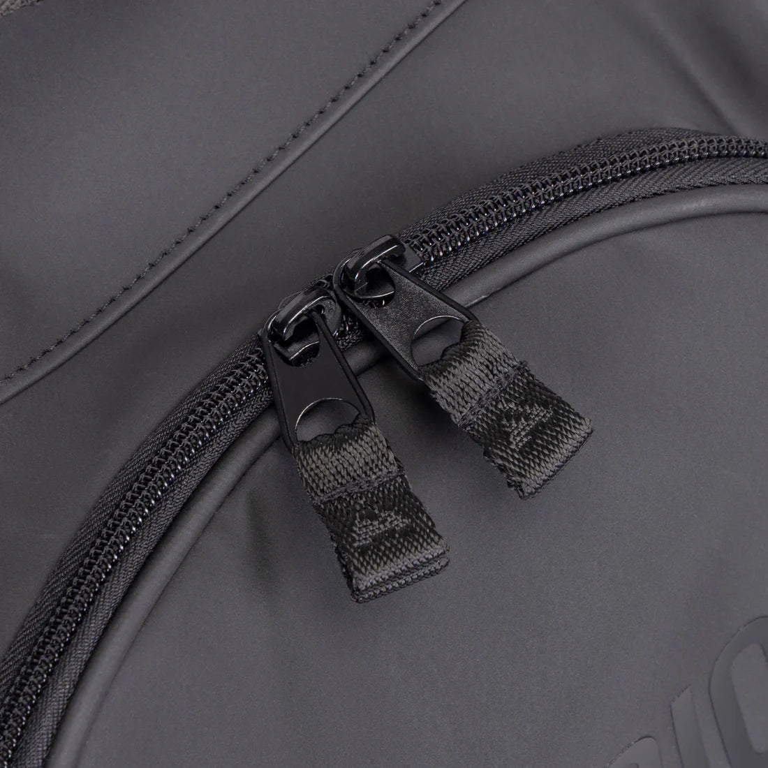 Close-up view of the dual zipper on the Aubrion React Long Boot Bag