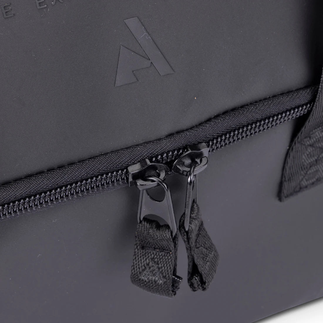 Close-up view of the zippers on the Aubrion React Groomking Kit Bag