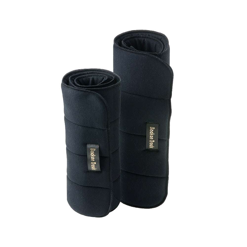 Side-by-side views of various sizes of rolled up Back on Track No Bow Leg Wraps on a white background