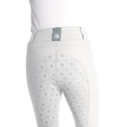 Back view of a model wearing the white Romfh Isabella Silicone Full Seat Breech on a plain background