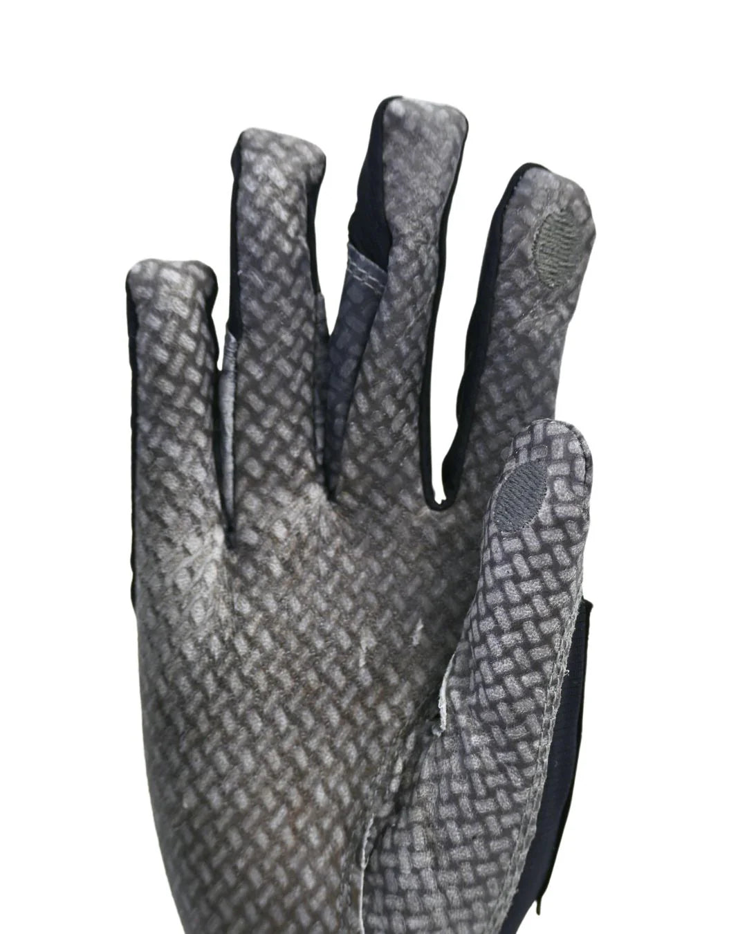 Close-up of the palm-side of a Correct Connect Oil-Tac Copper Tech Leather Premium Riding Glove in black on a white background