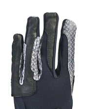 Close-up of the back of the Correct Connect Oil-Tac Copper Tech Leather Premium Riding Glove in black on a white background