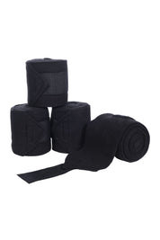 View of a set of black HKM Polo Wraps on a white background