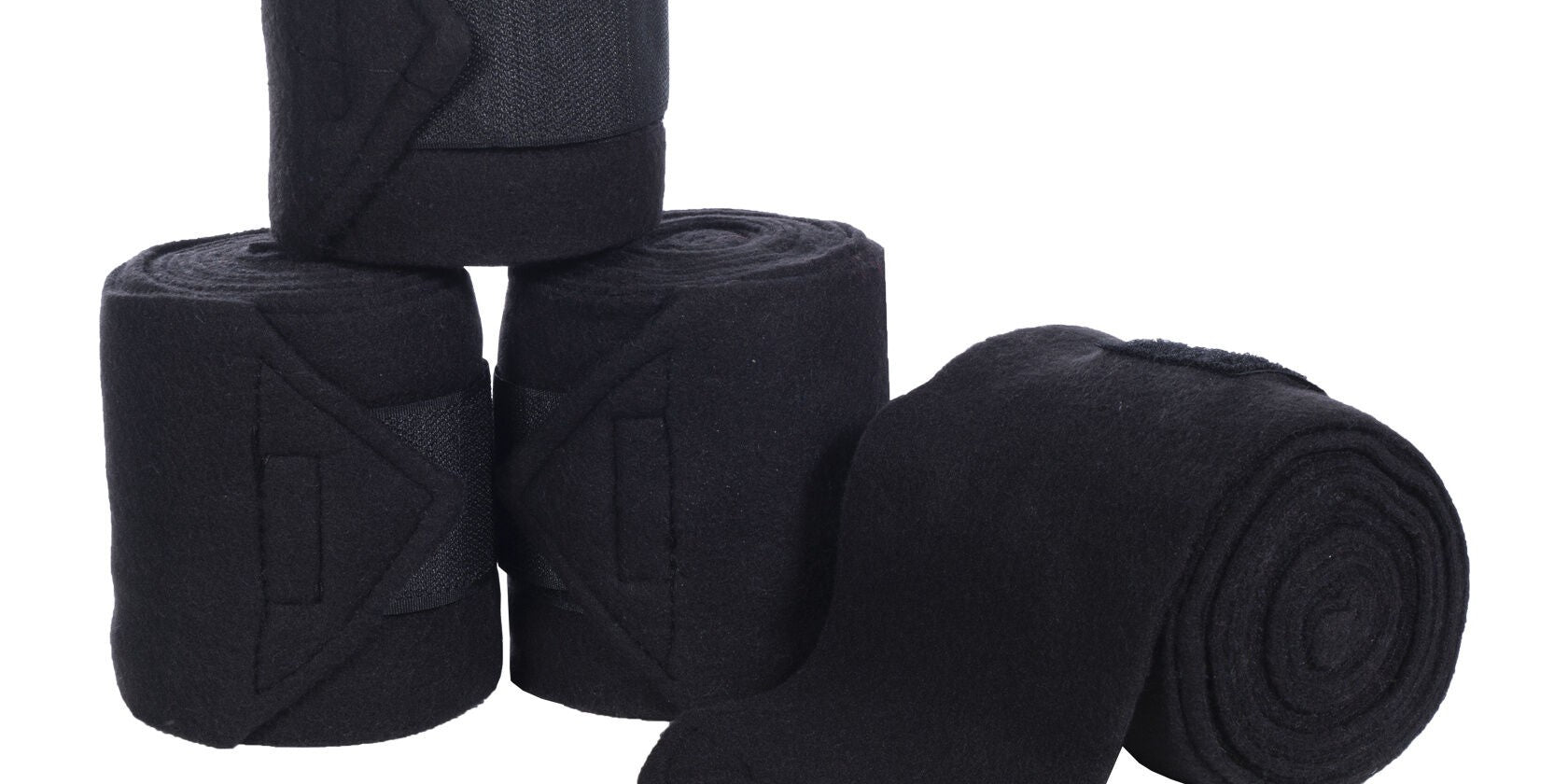 View of a set of black HKM Polo Wraps on a white background