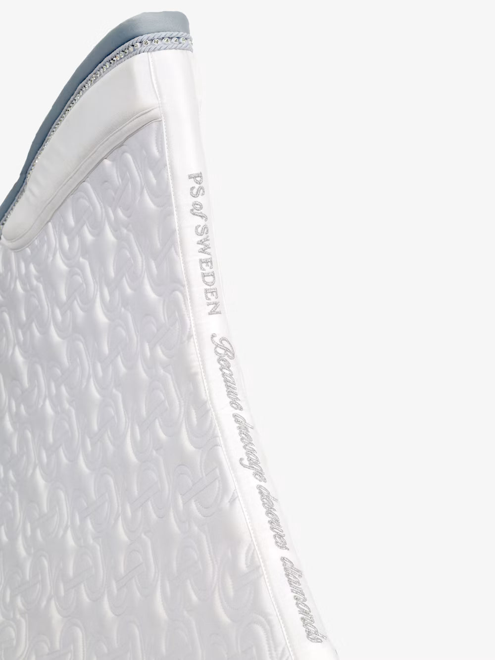 Spine view of the white PS of Sweden Crystal Satin Dressage Saddle Pad on a white background