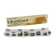 Front view of a tube of UlcerGard in plastic in front of its box packaging